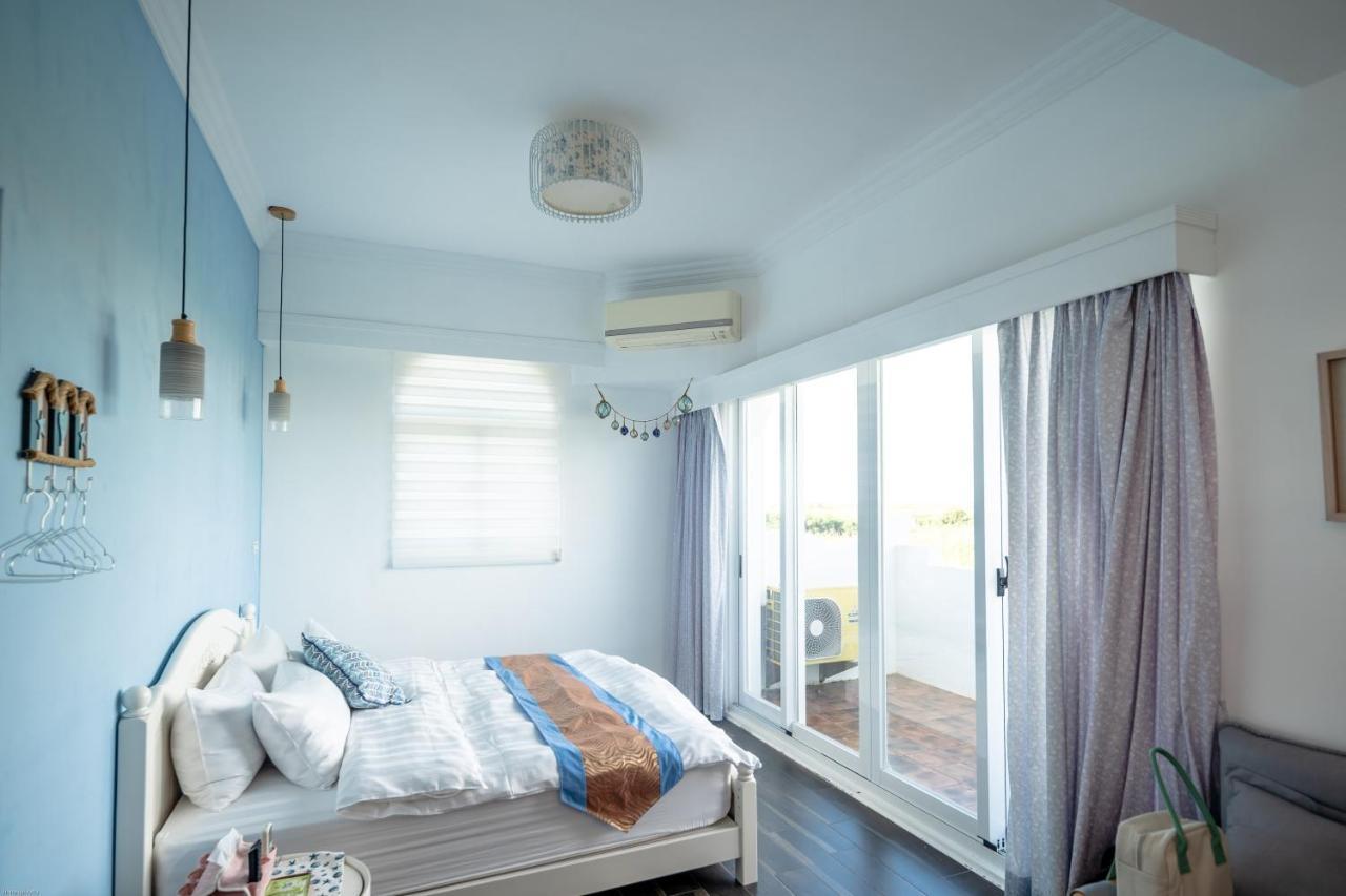 夏日澄藍the Charming Land Apartment Baisha Exterior photo